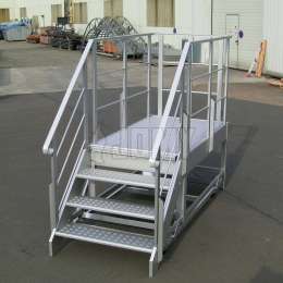 Mobile industrial workplatform Mobile aluminium workplatform with stairs and platform.
